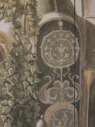The ornament on the facade of the building elf , entwined with bindweed . Detail of the mural \" Elven city.\" Wall number 2 . 