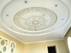 Circular ornamental painting on the ceiling - the kind in the interior.