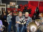 Director of Club-shop \"Tin\" Igor Stishkov, presents a birthday cake in honor of the anniversary of the 1st anniversary. Right - Igor Horohorin. 