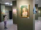 A young viewer at the paintings of Alexey Akindinov. Exhibition \"Inspiration by Ornament-2024\". Lyubertsy Art Gallery, 02/03/2024.