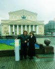 Alexey Akindinov and Ruslana Andriyanova. Moscow, Theatre Square, on October 19, 2015. Nearby – a tube with a picture \"the Birth of the Titan.\" Against the Bolshoi Theatre.
