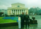 Alexey Akindinov Vladimir Medvedev. Moscow, Theatre Square, 19 October 2015. Next - tube with the painting \"The Birth of Titan.\" Against the background of the Bolshoi Theatre.