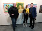 From left to right: Alexei Akindinov; Veronika Fedotova; Fyodor Filkov (Vice-President of the Eurasian Art Union) near Alexei\'s painting \"The Rose Fairy\". 