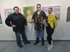 From left to right: Alexei Akindinov; producer of the TV channel \"Ren-TV\" Vyacheslav Klimov; Veronika Fedotova near Alexei\'s painting \"The Rose Fairy\". 