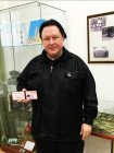 Alexey Akindinov with a membership card of the Russian Union of Professional Writers. Ryazan Regional Universal Scientific Library named after Gorky. November 12, 2022