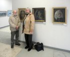 The artist Valentin Chavkin with the spouse – Aleksandra, against Valentin\'s works. The Spring 2015 exhibition devoted to the 70 anniversary of the Victory over fascism. Showroom of the Union of artists of Russia, Ryazan. April 23. Russia.