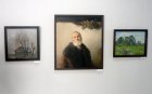 In the center – Lev Kostev\'s picture (a portrait of the artist Anatoly Filatov). The Spring 2015 exhibition devoted to the 70 anniversary of the Victory over fascism. Showroom of the Union of artists of Russia, Ryazan. April 23. Russia.