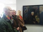 At the left – the artist Evgeny Borisov, against Vasily Nikolaev\'s picture. Opening of the Spring 2015 exhibition devoted to the 70 anniversary of the Victory over fascism. Showroom of the Union of artists of Russia, Ryazan. April 23. Russia.