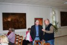 In the center artists Valery Deyev (at the left) and Valery Cheryomin against the background of Alexey Akindinov\'s pictures. Opening of a personal exhibition of Alexey Akindinov \"Patterns\". 