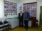 the left – to the right: the exposition devoted to heroes veterans has a director of Zakharovsky museum of local lore Anatoly A. Mirionkov and Alexey Akindinov. 